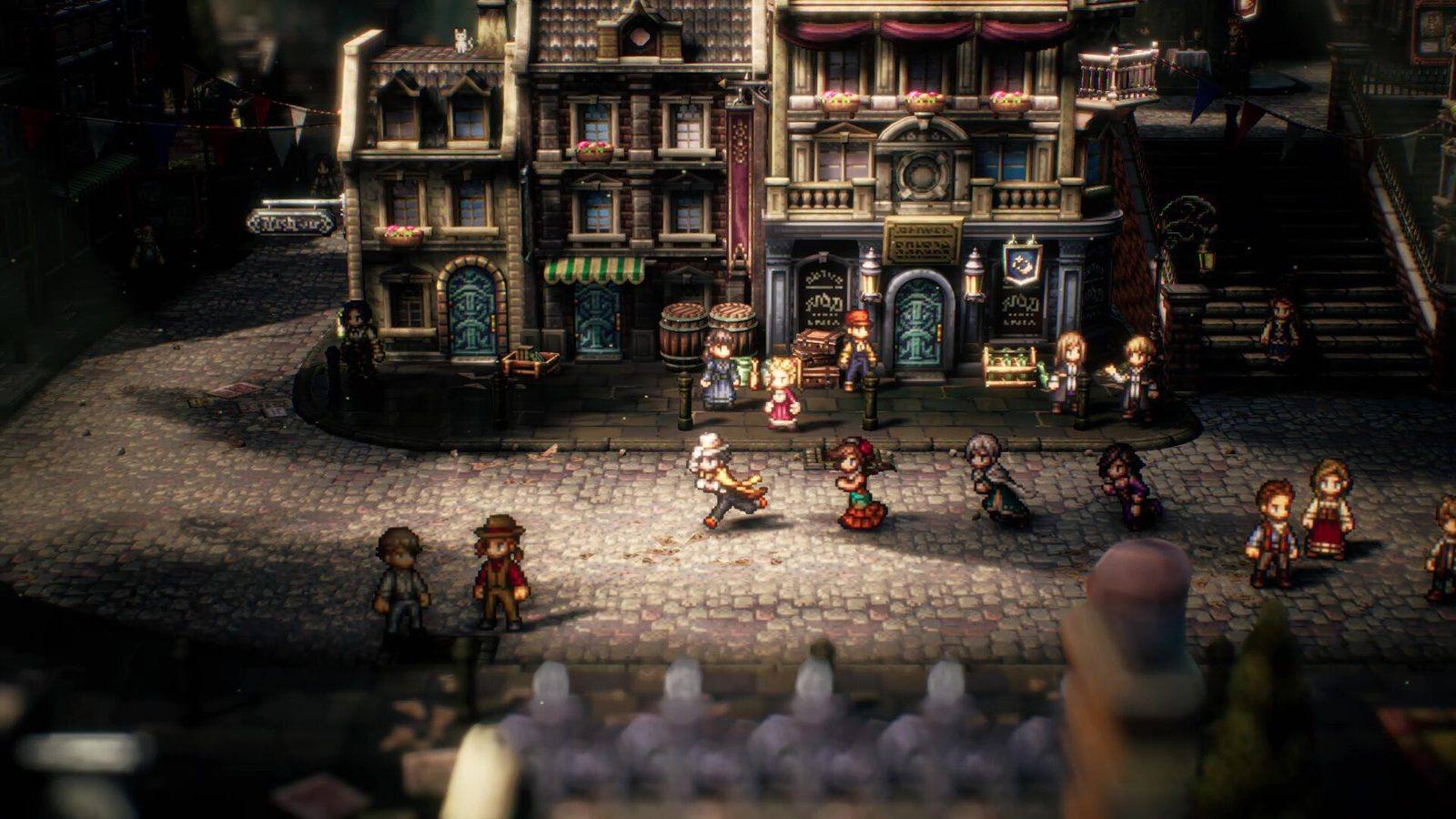 Plaza de una ciudad de Octopath Traveler II con edificios de ladrillo y personajes de pixel art caminando y bailando sobre el empedrado