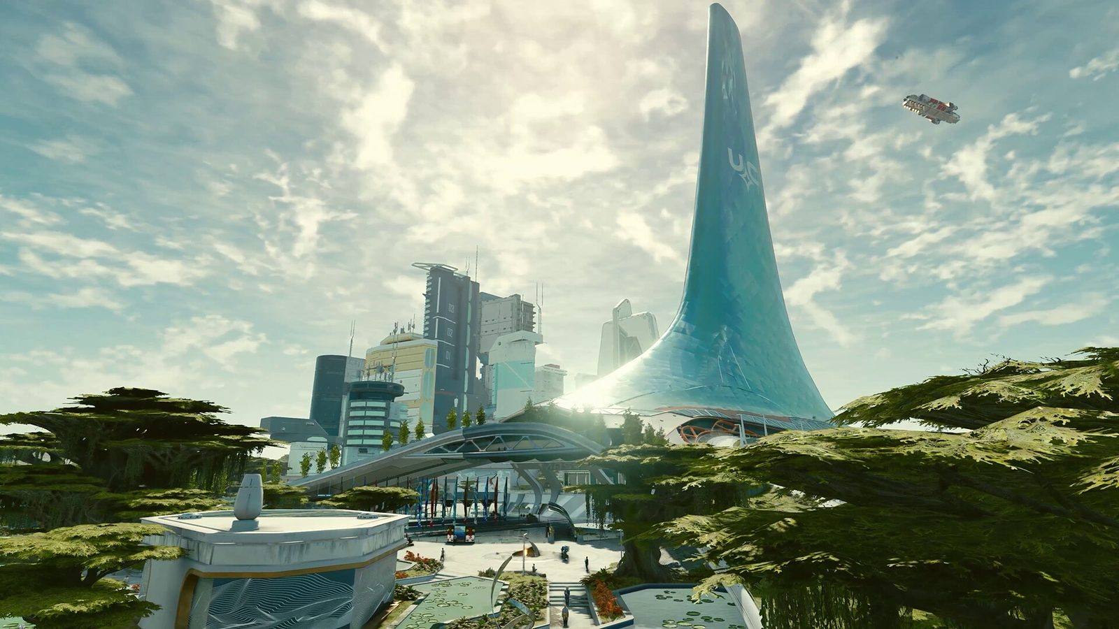 Vista de una ciudad futurista de Starfield con una torre alta y curva de cristal azul entre árboles y edificios, con una nave a lo lejos